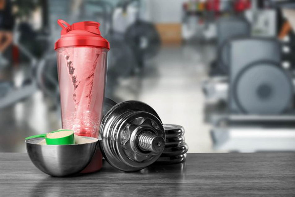 VOLTRX shaker bottle with gym equipment